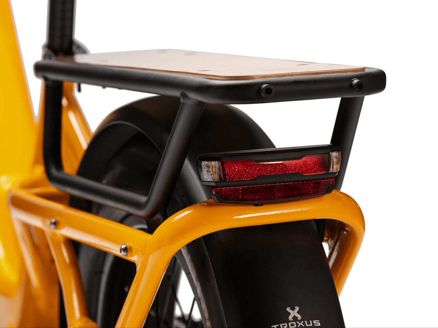 Close-up of Troxus Lynx Cargo Gloss Mango rear cargo rack with integrated rear light